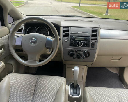 Черный Ниссан Тиида, объемом двигателя 1.6 л и пробегом 188 тыс. км за 5850 $, фото 27 на Automoto.ua