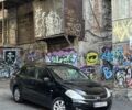 Черный Ниссан Тиида, объемом двигателя 1.6 л и пробегом 220 тыс. км за 5200 $, фото 1 на Automoto.ua