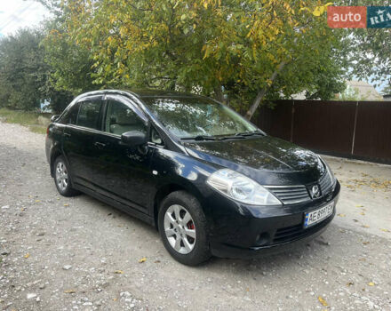 Черный Ниссан Тиида, объемом двигателя 1.6 л и пробегом 304 тыс. км за 4600 $, фото 1 на Automoto.ua