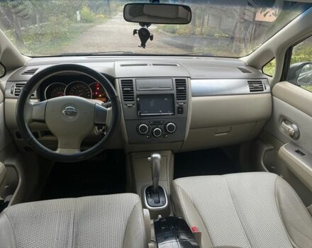 Черный Ниссан Тиида, объемом двигателя 1.6 л и пробегом 304 тыс. км за 4700 $, фото 11 на Automoto.ua