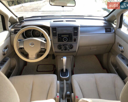 Черный Ниссан Тиида, объемом двигателя 1.6 л и пробегом 257 тыс. км за 5600 $, фото 19 на Automoto.ua