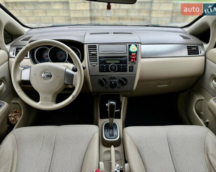 Черный Ниссан Тиида, объемом двигателя 1.6 л и пробегом 132 тыс. км за 4850 $, фото 8 на Automoto.ua