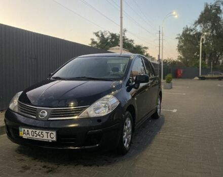 Черный Ниссан Тиида, объемом двигателя 1.6 л и пробегом 200 тыс. км за 4100 $, фото 1 на Automoto.ua