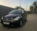 Черный Ниссан Тиида, объемом двигателя 1.6 л и пробегом 200 тыс. км за 4100 $, фото 1 на Automoto.ua