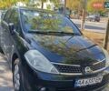 Черный Ниссан Тиида, объемом двигателя 1.6 л и пробегом 250 тыс. км за 5500 $, фото 1 на Automoto.ua