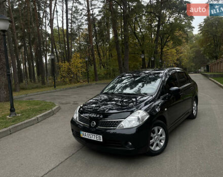 Черный Ниссан Тиида, объемом двигателя 1.6 л и пробегом 188 тыс. км за 5850 $, фото 2 на Automoto.ua
