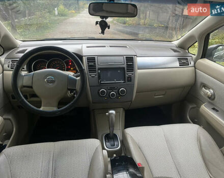 Черный Ниссан Тиида, объемом двигателя 1.6 л и пробегом 304 тыс. км за 4600 $, фото 12 на Automoto.ua