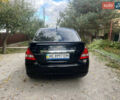Черный Ниссан Тиида, объемом двигателя 1.6 л и пробегом 304 тыс. км за 4600 $, фото 4 на Automoto.ua