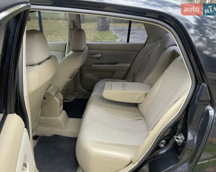 Черный Ниссан Тиида, объемом двигателя 1.6 л и пробегом 188 тыс. км за 5850 $, фото 19 на Automoto.ua