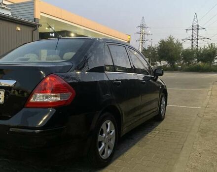 Черный Ниссан Тиида, объемом двигателя 1.6 л и пробегом 200 тыс. км за 4250 $, фото 3 на Automoto.ua