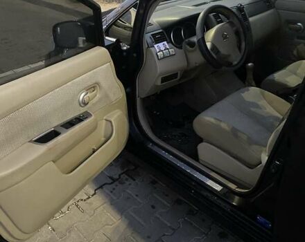 Черный Ниссан Тиида, объемом двигателя 1.6 л и пробегом 200 тыс. км за 4250 $, фото 4 на Automoto.ua