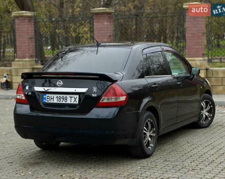 Черный Ниссан Тиида, объемом двигателя 1.6 л и пробегом 132 тыс. км за 4850 $, фото 2 на Automoto.ua