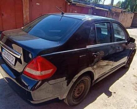 Черный Ниссан Тиида, объемом двигателя 1.6 л и пробегом 210 тыс. км за 3900 $, фото 2 на Automoto.ua