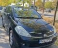 Черный Ниссан Тиида, объемом двигателя 1.6 л и пробегом 250 тыс. км за 5500 $, фото 1 на Automoto.ua