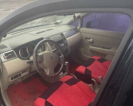 Черный Ниссан Тиида, объемом двигателя 1.6 л и пробегом 150 тыс. км за 5600 $, фото 3 на Automoto.ua