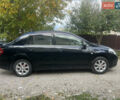 Черный Ниссан Тиида, объемом двигателя 1.6 л и пробегом 304 тыс. км за 4600 $, фото 2 на Automoto.ua