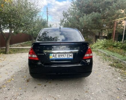 Черный Ниссан Тиида, объемом двигателя 1.6 л и пробегом 304 тыс. км за 4700 $, фото 4 на Automoto.ua