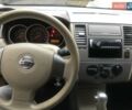 Черный Ниссан Тиида, объемом двигателя 1.6 л и пробегом 210 тыс. км за 3900 $, фото 5 на Automoto.ua