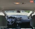 Чорний Ніссан Тііда, об'ємом двигуна 1.6 л та пробігом 173 тис. км за 5999 $, фото 4 на Automoto.ua