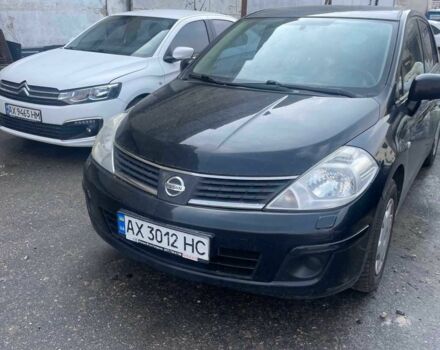 Черный Ниссан Тиида, объемом двигателя 1.6 л и пробегом 119 тыс. км за 6000 $, фото 6 на Automoto.ua