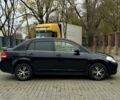 Черный Ниссан Тиида, объемом двигателя 1.6 л и пробегом 130 тыс. км за 4850 $, фото 4 на Automoto.ua
