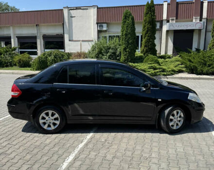 Черный Ниссан Тиида, объемом двигателя 1.6 л и пробегом 165 тыс. км за 7000 $, фото 12 на Automoto.ua