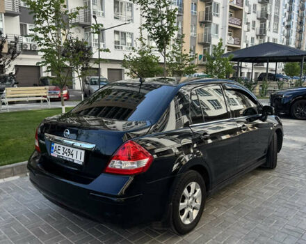 Черный Ниссан Тиида, объемом двигателя 1.6 л и пробегом 165 тыс. км за 7000 $, фото 2 на Automoto.ua