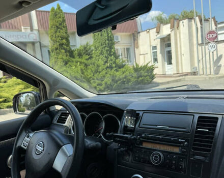 Черный Ниссан Тиида, объемом двигателя 1.6 л и пробегом 165 тыс. км за 7000 $, фото 56 на Automoto.ua