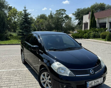 Черный Ниссан Тиида, объемом двигателя 1.6 л и пробегом 165 тыс. км за 7000 $, фото 14 на Automoto.ua