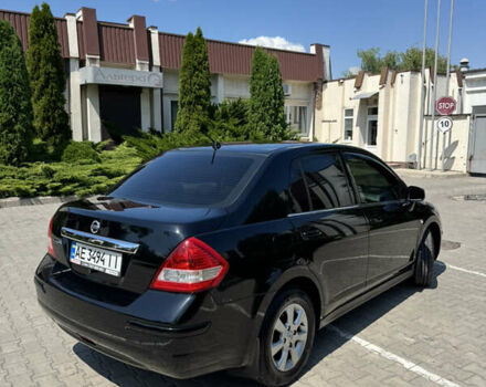 Черный Ниссан Тиида, объемом двигателя 1.6 л и пробегом 165 тыс. км за 7000 $, фото 11 на Automoto.ua