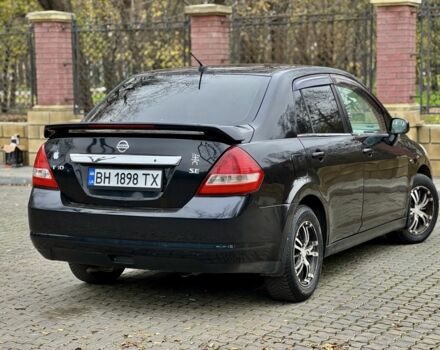 Черный Ниссан Тиида, объемом двигателя 1.6 л и пробегом 130 тыс. км за 4850 $, фото 7 на Automoto.ua