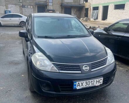 Черный Ниссан Тиида, объемом двигателя 1.6 л и пробегом 119 тыс. км за 6000 $, фото 5 на Automoto.ua