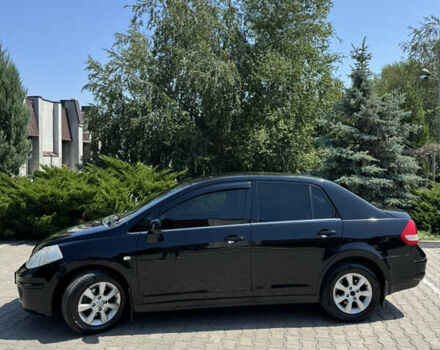 Черный Ниссан Тиида, объемом двигателя 1.6 л и пробегом 165 тыс. км за 7000 $, фото 5 на Automoto.ua