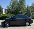 Черный Ниссан Тиида, объемом двигателя 1.6 л и пробегом 165 тыс. км за 7000 $, фото 5 на Automoto.ua