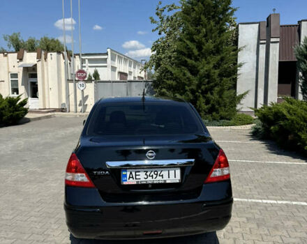 Черный Ниссан Тиида, объемом двигателя 1.6 л и пробегом 165 тыс. км за 7000 $, фото 9 на Automoto.ua