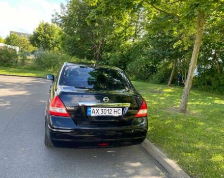 Черный Ниссан Тиида, объемом двигателя 1.6 л и пробегом 119 тыс. км за 6000 $, фото 2 на Automoto.ua