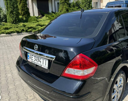 Черный Ниссан Тиида, объемом двигателя 1.6 л и пробегом 165 тыс. км за 7000 $, фото 51 на Automoto.ua