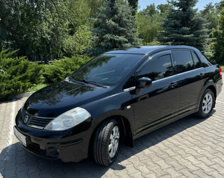 Черный Ниссан Тиида, объемом двигателя 1.6 л и пробегом 165 тыс. км за 7000 $, фото 17 на Automoto.ua