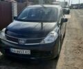Черный Ниссан Тиида, объемом двигателя 1.8 л и пробегом 270 тыс. км за 2900 $, фото 18 на Automoto.ua
