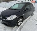 Черный Ниссан Тиида, объемом двигателя 1.6 л и пробегом 136 тыс. км за 6500 $, фото 1 на Automoto.ua