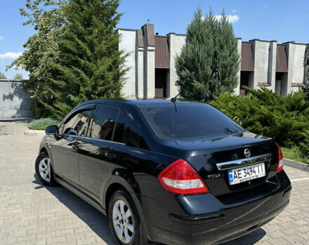 Черный Ниссан Тиида, объемом двигателя 1.6 л и пробегом 165 тыс. км за 7000 $, фото 7 на Automoto.ua