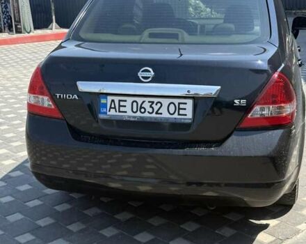 Чорний Ніссан Тііда, об'ємом двигуна 1.6 л та пробігом 227 тис. км за 5799 $, фото 3 на Automoto.ua