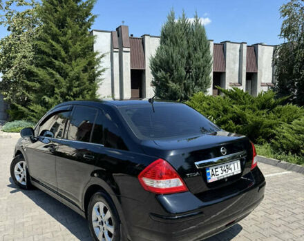 Черный Ниссан Тиида, объемом двигателя 1.6 л и пробегом 165 тыс. км за 7000 $, фото 8 на Automoto.ua