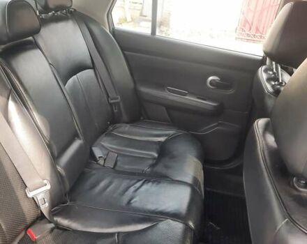 Черный Ниссан Тиида, объемом двигателя 1.8 л и пробегом 270 тыс. км за 2900 $, фото 32 на Automoto.ua