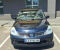 Черный Ниссан Тиида, объемом двигателя 1.6 л и пробегом 223 тыс. км за 5500 $, фото 1 на Automoto.ua