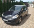 Черный Ниссан Тиида, объемом двигателя 1.8 л и пробегом 272 тыс. км за 3005 $, фото 1 на Automoto.ua
