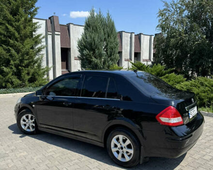 Черный Ниссан Тиида, объемом двигателя 1.6 л и пробегом 165 тыс. км за 7000 $, фото 6 на Automoto.ua