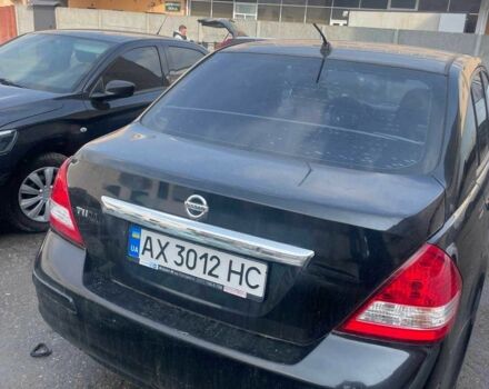 Черный Ниссан Тиида, объемом двигателя 1.6 л и пробегом 119 тыс. км за 6000 $, фото 4 на Automoto.ua