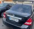 Черный Ниссан Тиида, объемом двигателя 1.6 л и пробегом 119 тыс. км за 6000 $, фото 4 на Automoto.ua