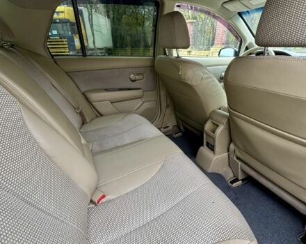 Черный Ниссан Тиида, объемом двигателя 1.6 л и пробегом 130 тыс. км за 4850 $, фото 5 на Automoto.ua